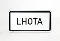Town sign: Lhota, National Museum of Agriculture